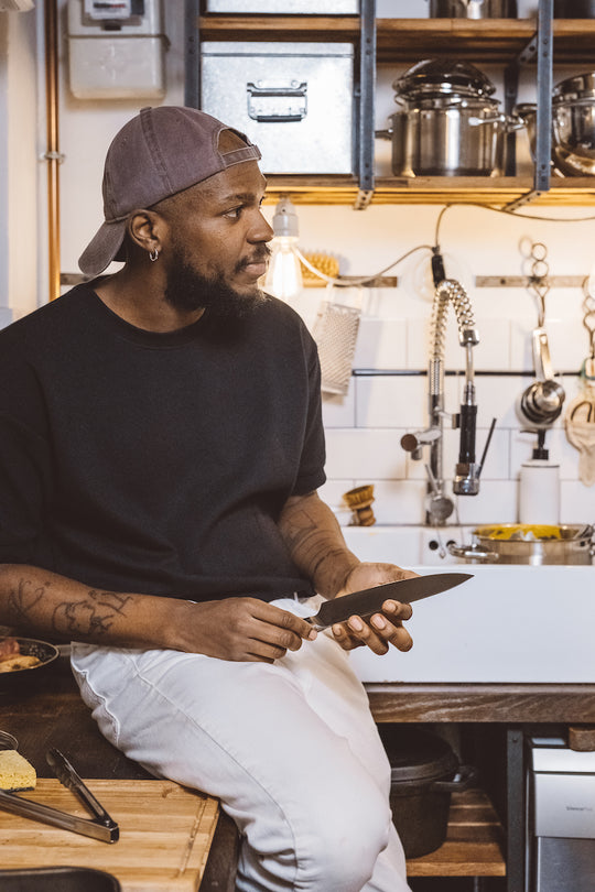 Chef Christ Bikouedi with the chef's knife